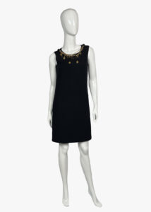 Dolce & Gabbana wool dress decorated with golden chains and medallions