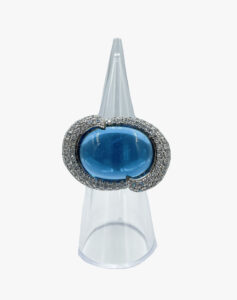 Rings in silver tone with accent blue rhinestone