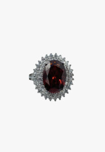 Silver-tone ring with large red rhinestones