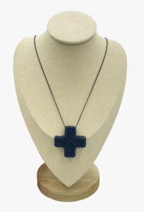 Cross pendant with rhinestones on a chain