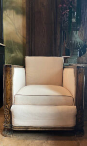 Antique armchair with beige jacquard fabric and wood