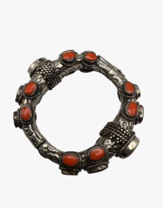 Vintage tibetan bracelet with artificial coral stones