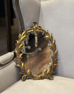 Vintage mirror in gold-tone frame